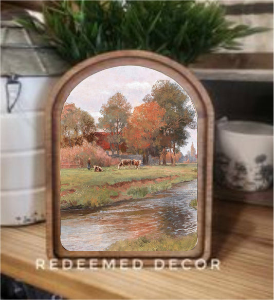 Arch top framed canvas art of autumn farm pastoral scene with cows and stream