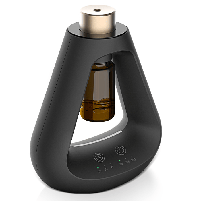 Candyl Delta black waterless essential oil diffuser with amber glass bottle and gold nozzle