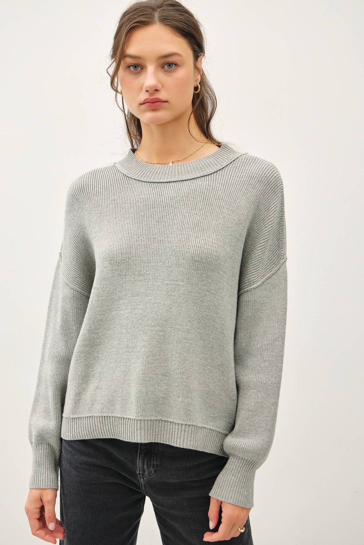 Relaxed heather grey ribbed knit sweater with drop shoulders and round neckline