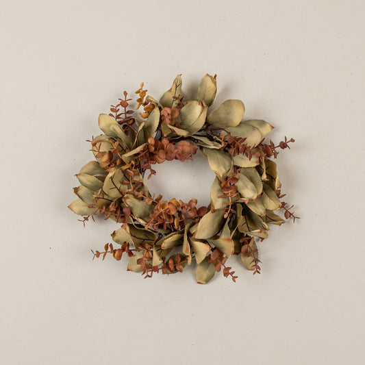 12 inch eucalyptus and laurel candle ring with sage green leaves and rust brown accents