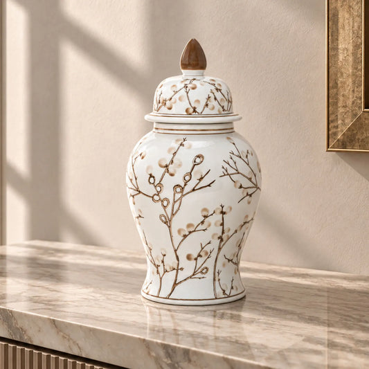 White ceramic ginger jar urn with brown willow branch pattern and domed lid
