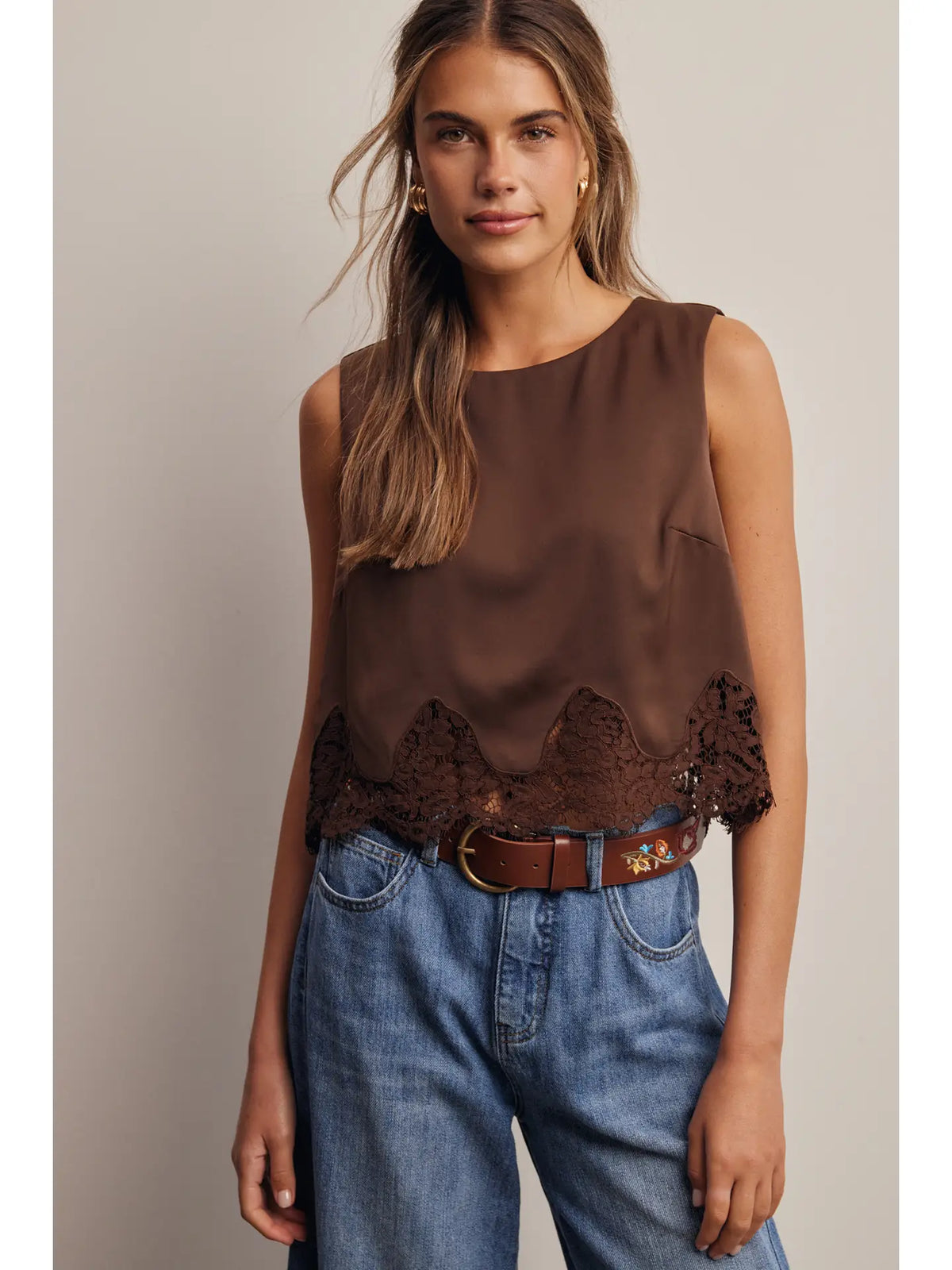 Brown satin sleeveless crop top with dark lace scalloped hem detail