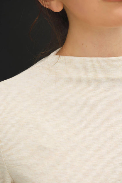 Be Cool cream ribbed mockneck knit top with subtle texture, worn by model