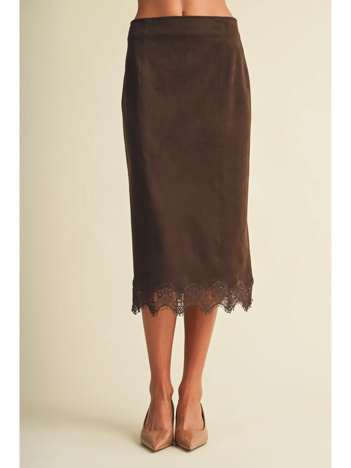 Dark brown microsuede midi skirt with scallop lace hem trim, styled with nude heels