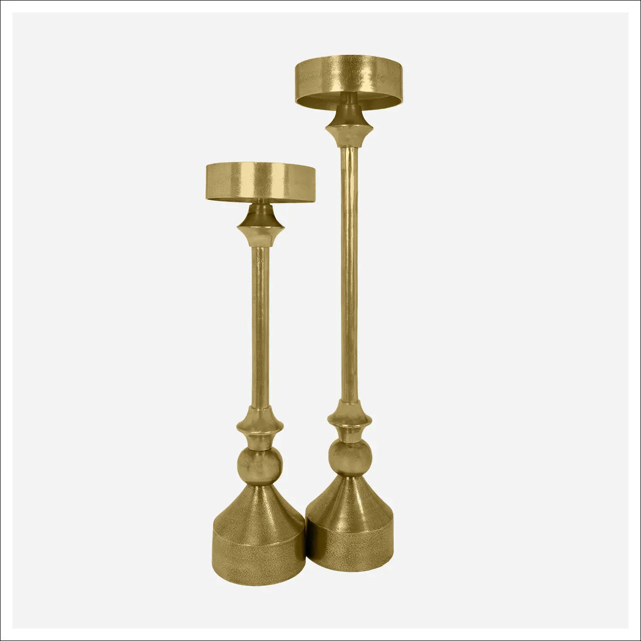 Set of two gold metal pillar candleholders in tall and extra-tall sizes