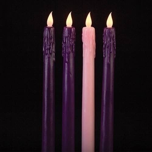 Four LED taper advent candles, three purple and one pink, with flameless glow