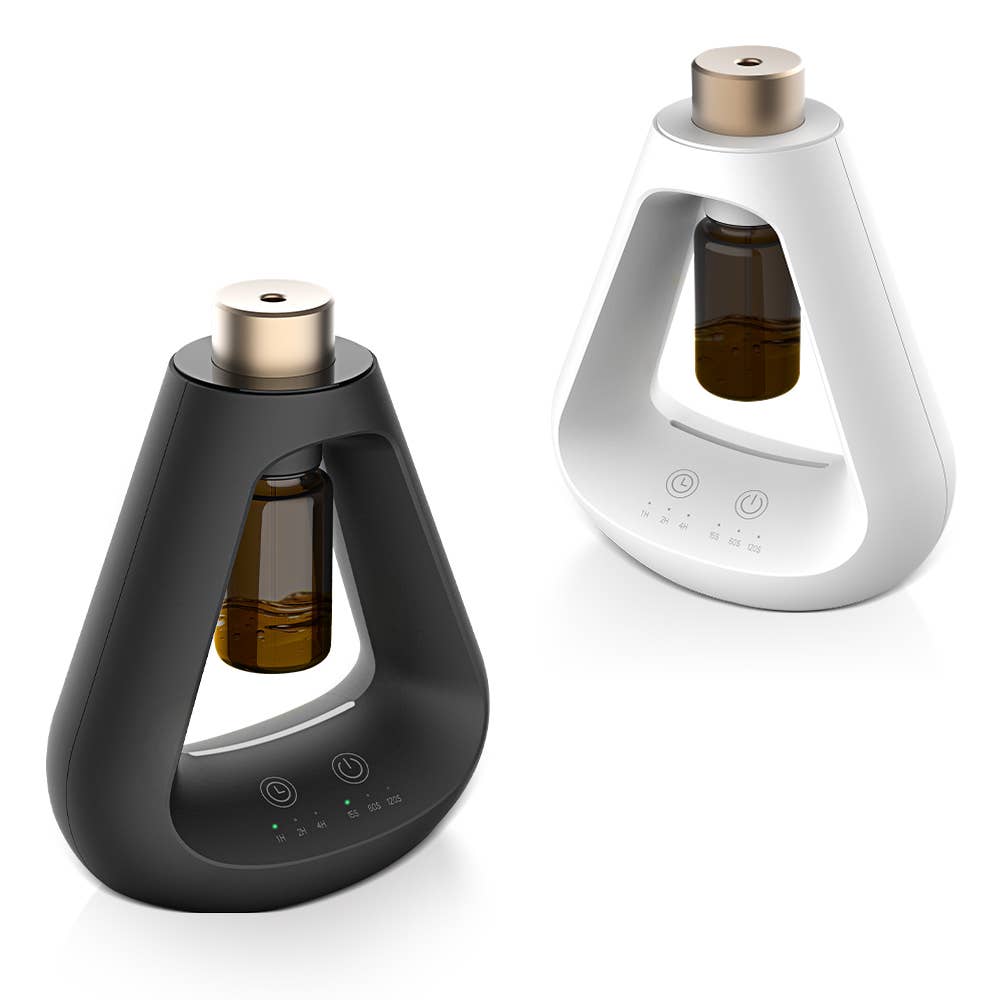 Candyl Delta waterless essential oil diffuser in black and white with gold top