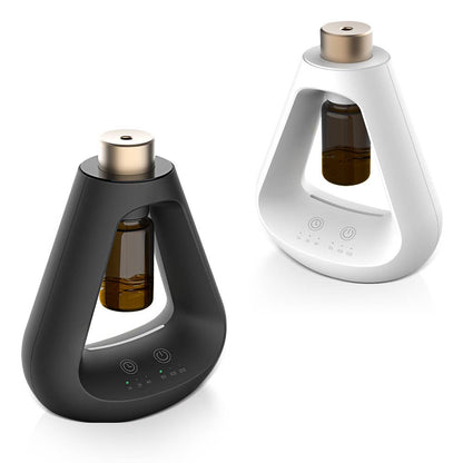 Candyl Delta waterless essential oil diffuser in black and white with gold top