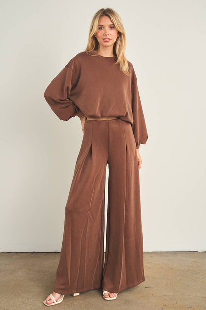 Chocolate brown wide-leg palazzo pants with pleated front and high waist