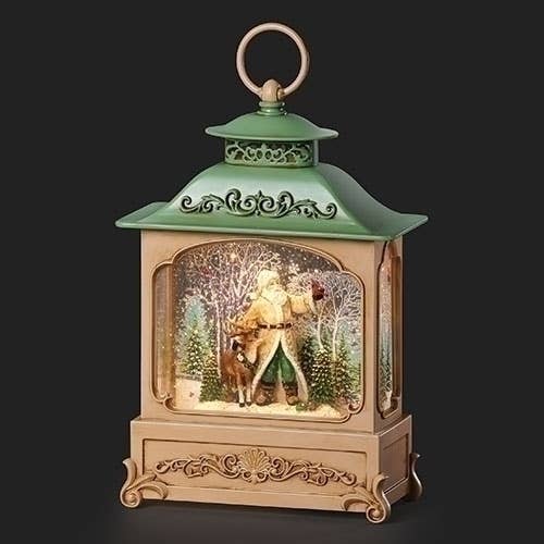 Green and gold lighted Christmas lantern with Santa and deer snow globe scene