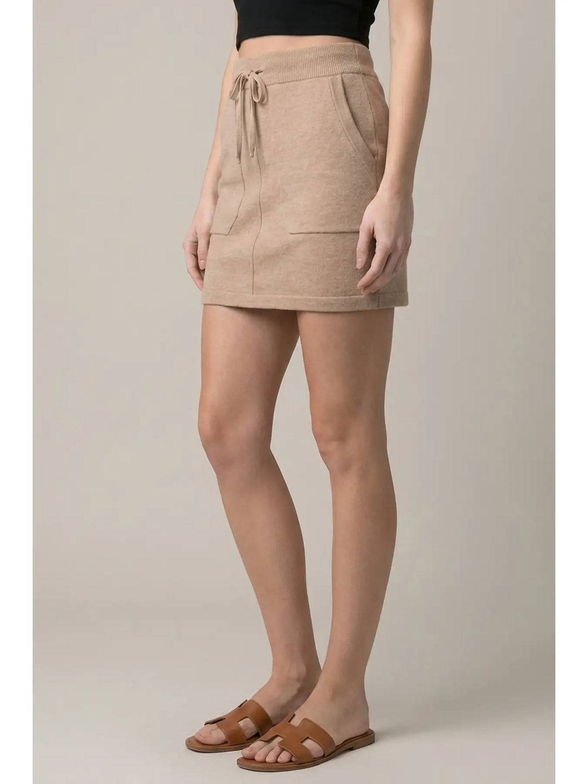 Doe and Rae taupe knit mini skirt with drawstring waist and front pockets