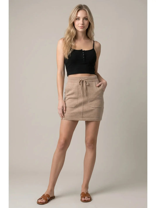 Taupe knit mini skirt with drawstring waist and front patch pockets