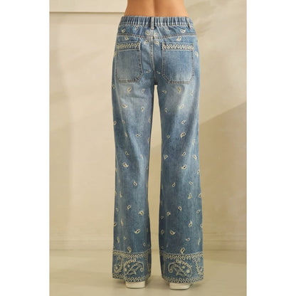 Olive Tree wide-leg light wash jeans with all-over paisley embroidery and border hem
