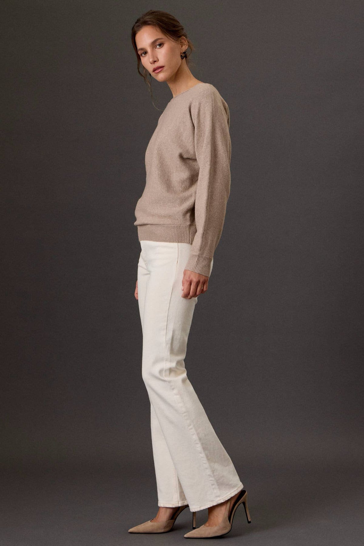 Heathered taupe boat neck sweater with ribbed cuffs and hem, paired with white pants