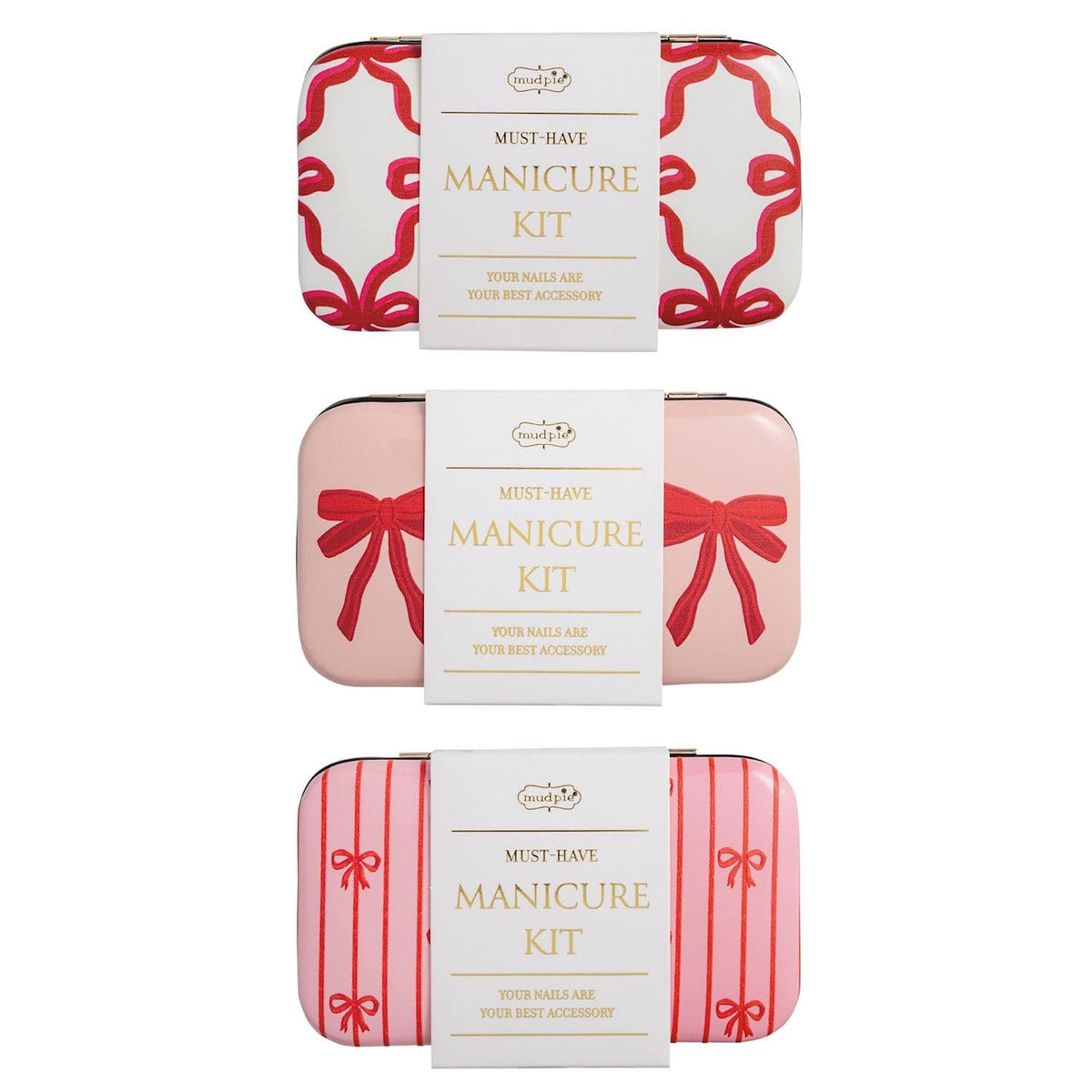 Mud Pie manicure kits in three bow-print tin cases: white, blush pink, and pink stripe