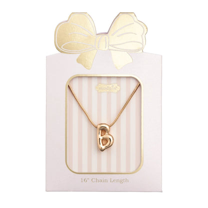 Mudpie gold letter B initial pendant necklace on pink striped gift card packaging