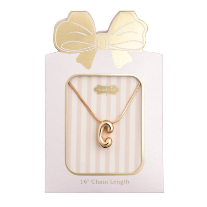 Mud Pie gold letter C initial pendant necklace on pink gift card packaging