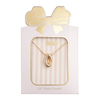 Mud Pie gold oval initial O pendant necklace on pink striped gift card packaging