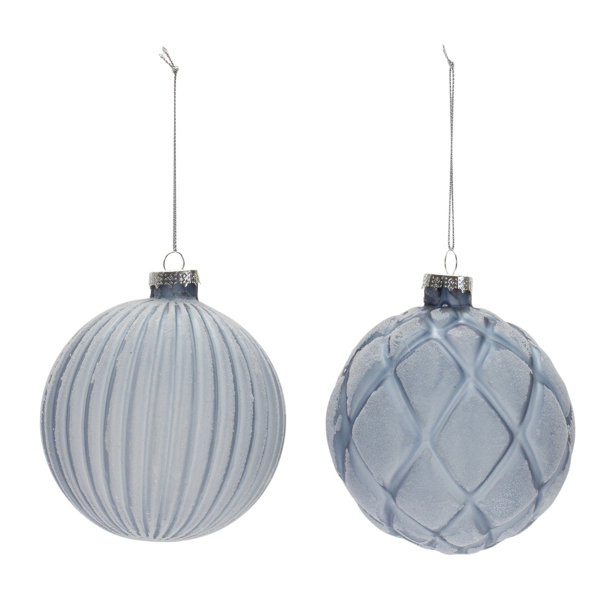 Two frosted blue glass ball ornaments with ribbed and diamond lattice patterns, silver caps