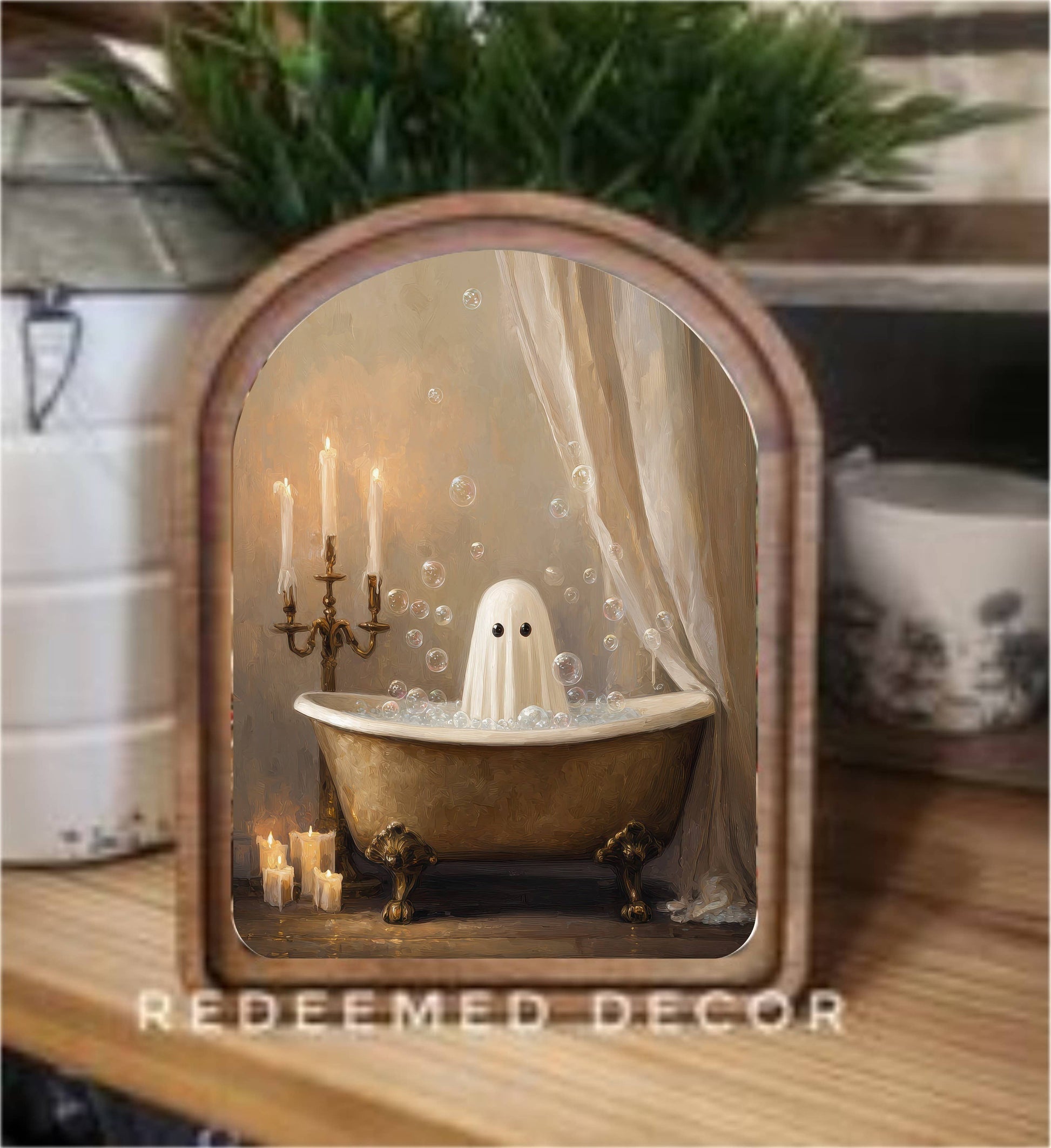 Arched wood-framed canvas art of a ghost in a gold clawfoot bathtub with candles