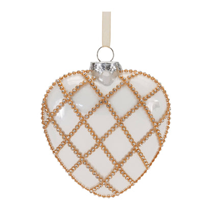 Heart-shaped glass ornament with gold beaded diamond lattice pattern and ribbon hanger