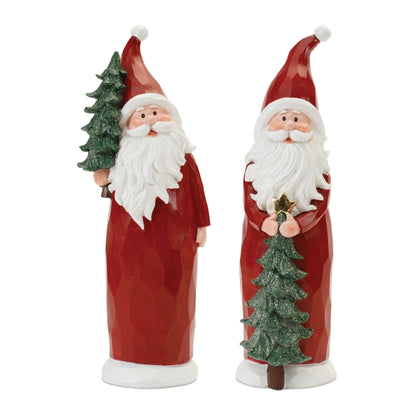 Two Santa Claus resin figurines in red robes holding green glittered Christmas trees, front view
