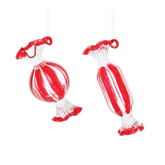 Two glass candy-shaped ornaments with red and white stripes, hanging on strings