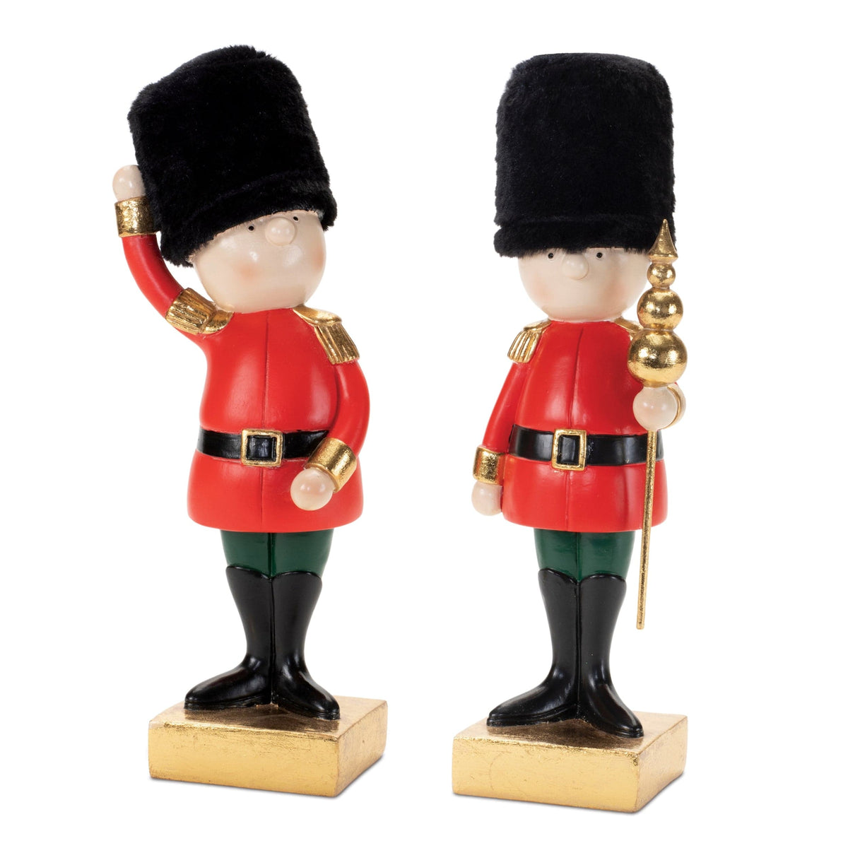 Two chubby royal guard figurines in red uniforms, one saluting and one holding a scepter