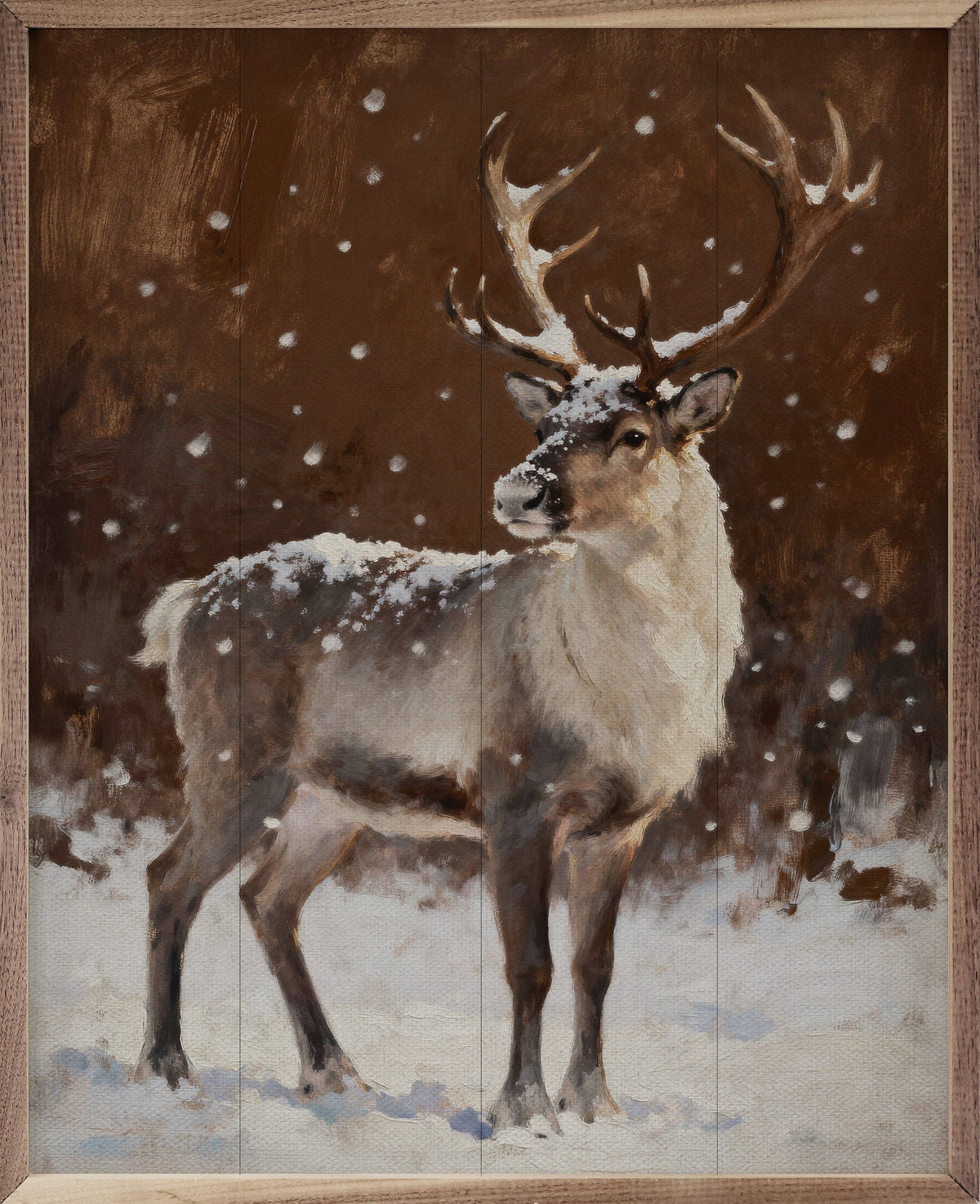 Framed oil painting of a reindeer standing in snow with falling snowflakes