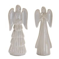 Two white ceramic angel figurines with detailed robes and wings