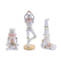 Set of 3 white and rose gold yoga pose nutcracker soldier figurines