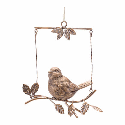 Gold metal bird figurine perched on a branch swing ornament with leaf details