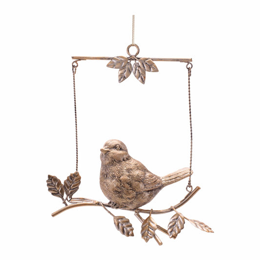 Gold metal bird figurine perched on a branch swing ornament with leaf details