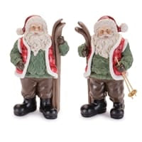 Two Santa Claus resin figurines holding skis and poles in green and red suit