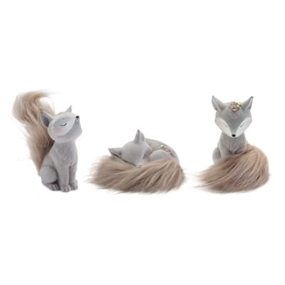 Three gray resin fox figurines with soft brown faux fur tails in varied sizes