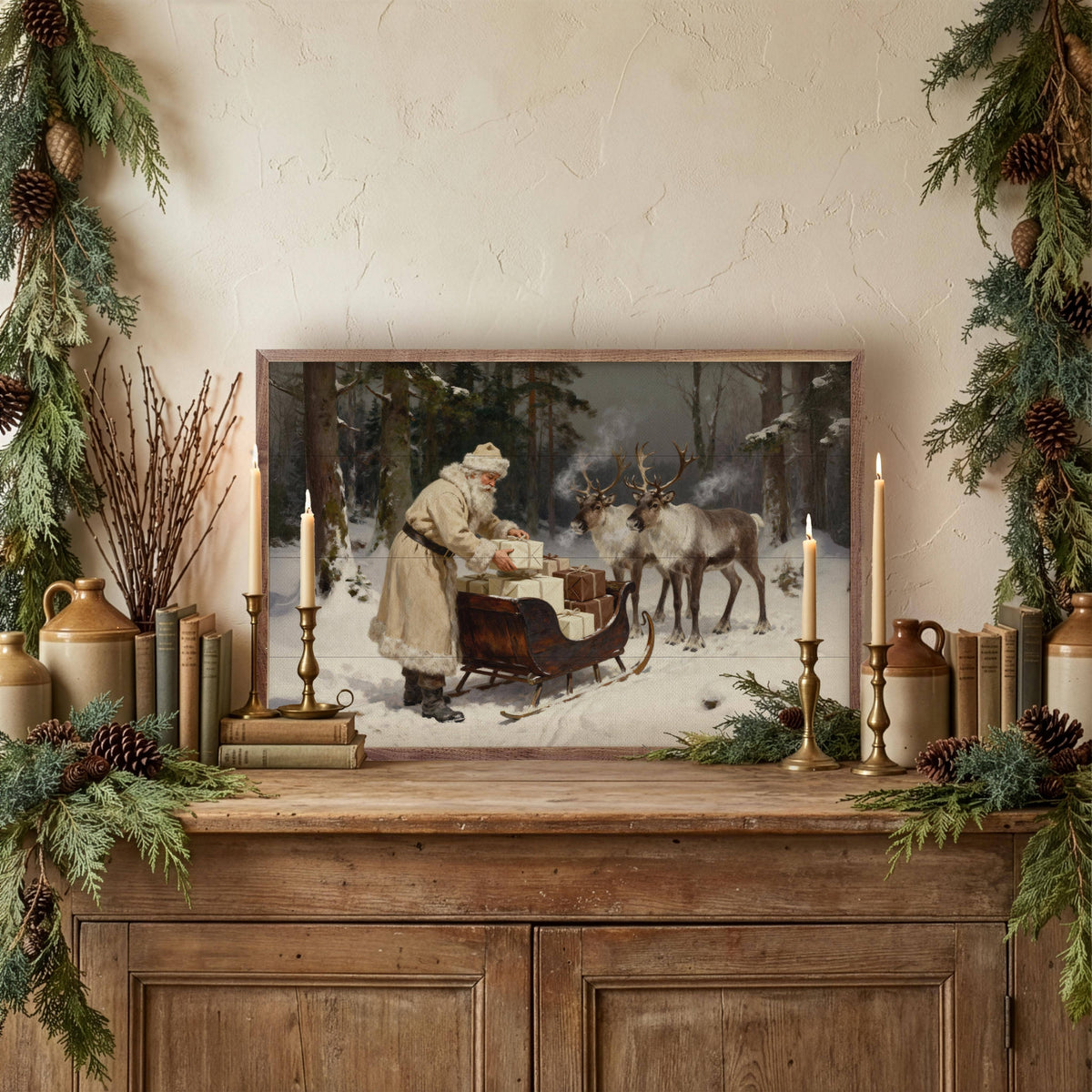 Framed vintage Santa with reindeer sleigh art on rustic wood console with holiday decor
