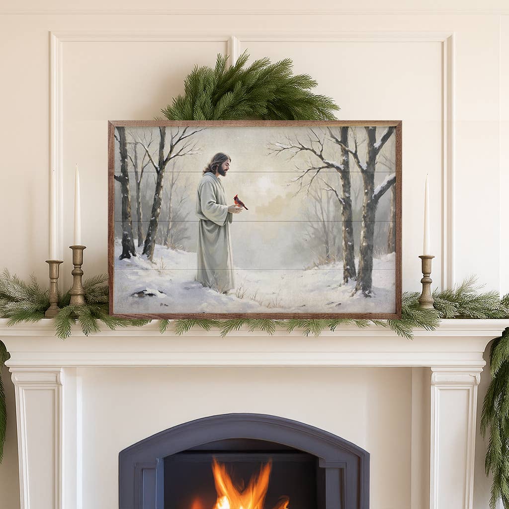 Framed wood art print of Jesus holding a red cardinal in a snowy winter forest