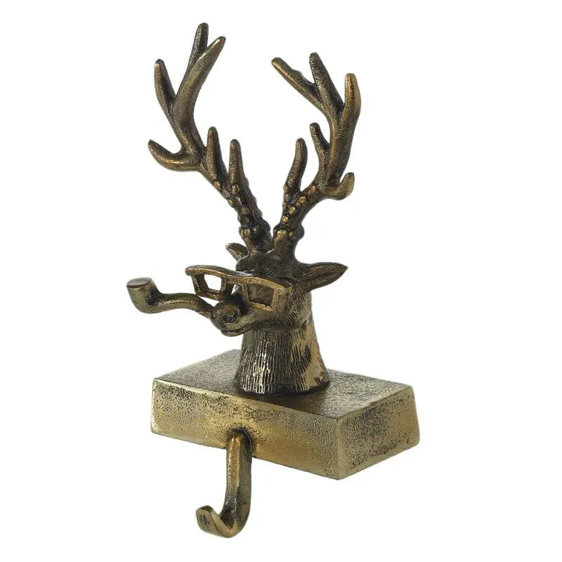 Gold brass stag head stocking holder with antlers, glasses, and mantel hook