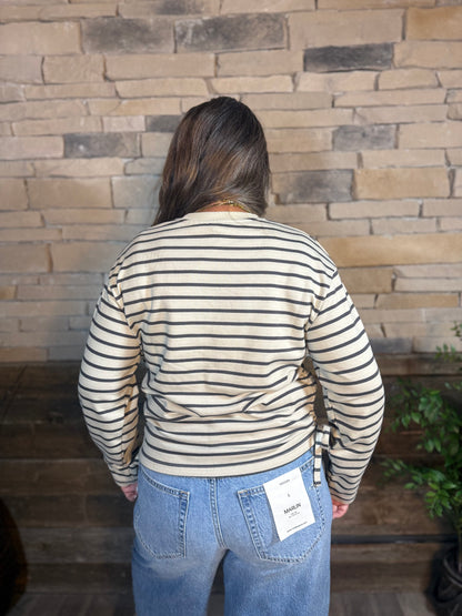 Cream and navy striped long sleeve crewneck sweatshirt with side drawstring detail