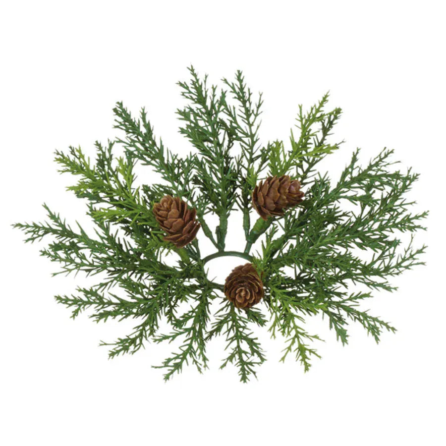Artificial arborvitae candle ring with three brown pinecones on green cedar branches