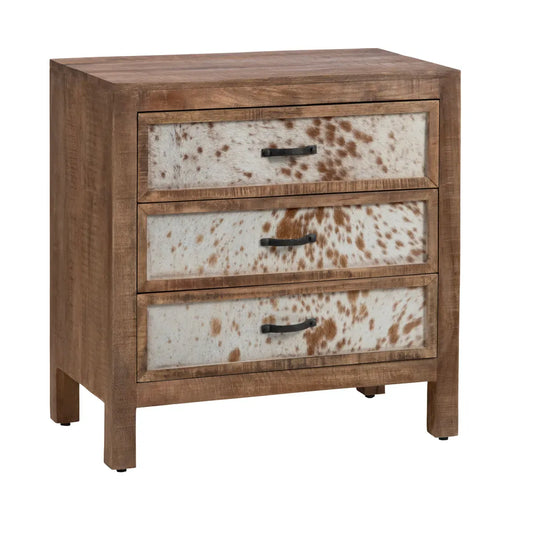 Three-drawer wood chest with brown and white cowhide drawer fronts and black iron handles