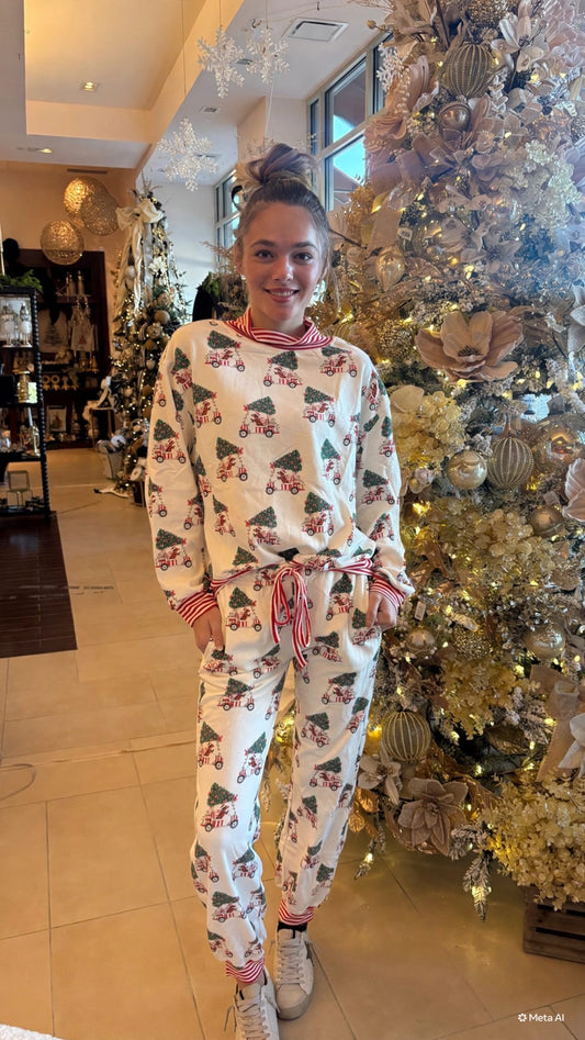 White holiday lounge pants with Christmas tree and truck print, red striped cuffs