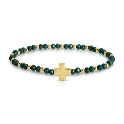 Green crystal stretch bracelet with gold beads and gold cross charm