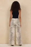 Wide leg jeans in washed leopard print, relaxed fit, full length, back view