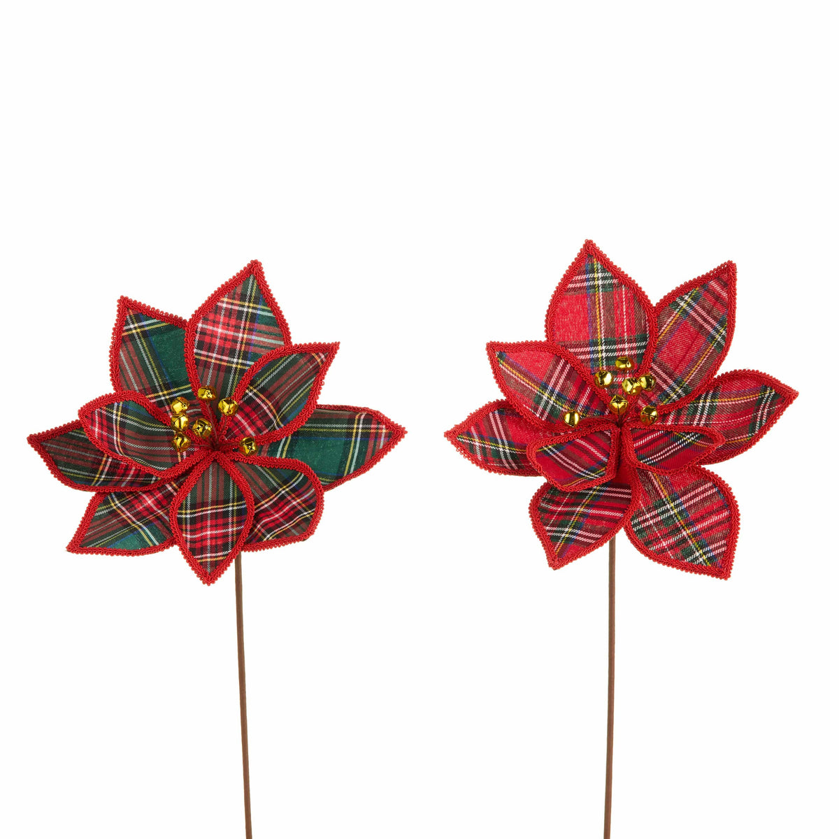 Two fabric plaid poinsettia flower picks on stems with gold jingle bell centers, studio view