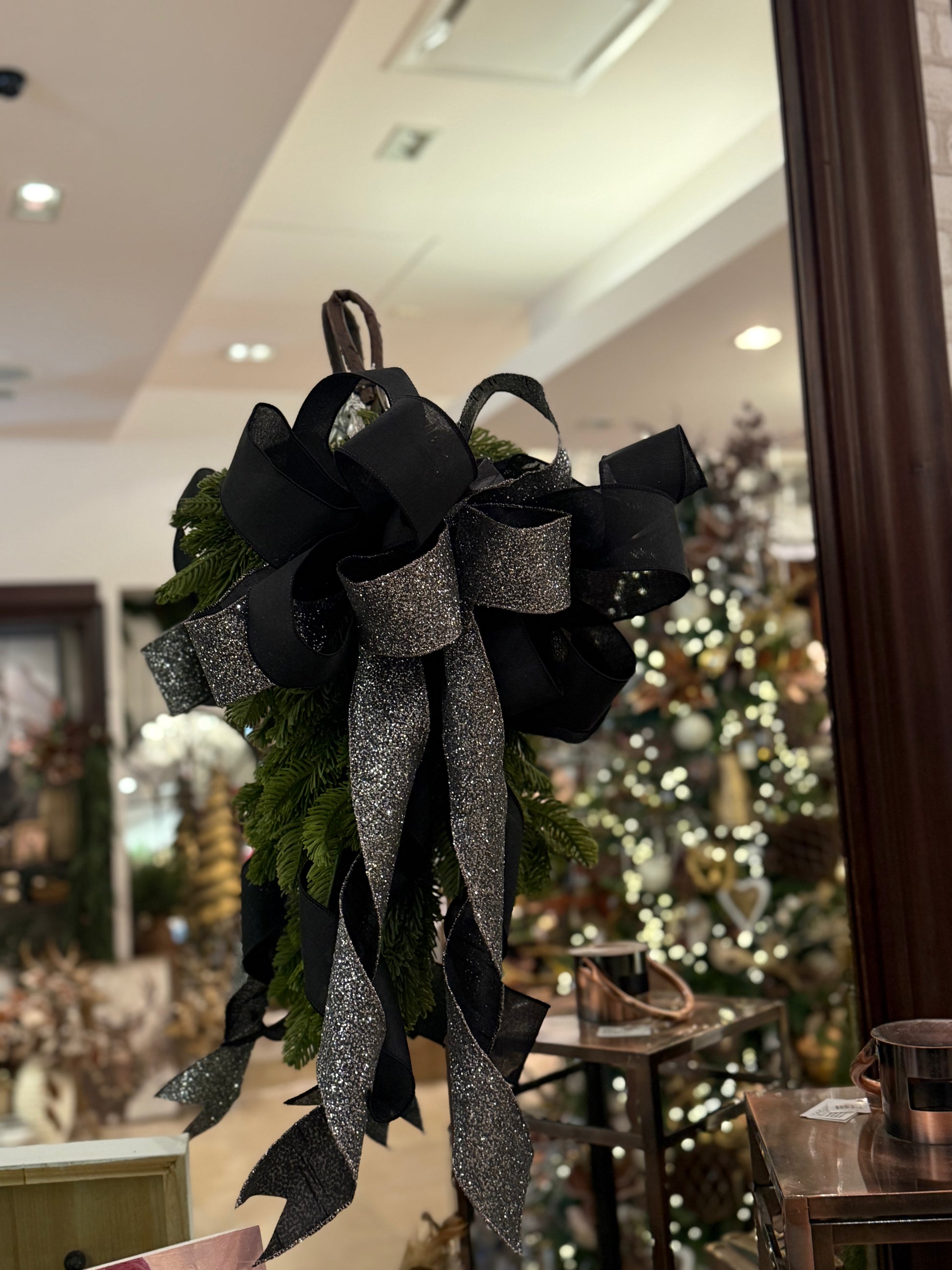 Cheris Customs black velvet and silver glitter ribbon bow with evergreen sprigs
