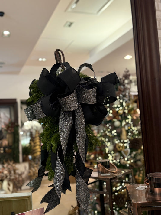 Cheris Customs black velvet and silver glitter ribbon bow with evergreen sprigs