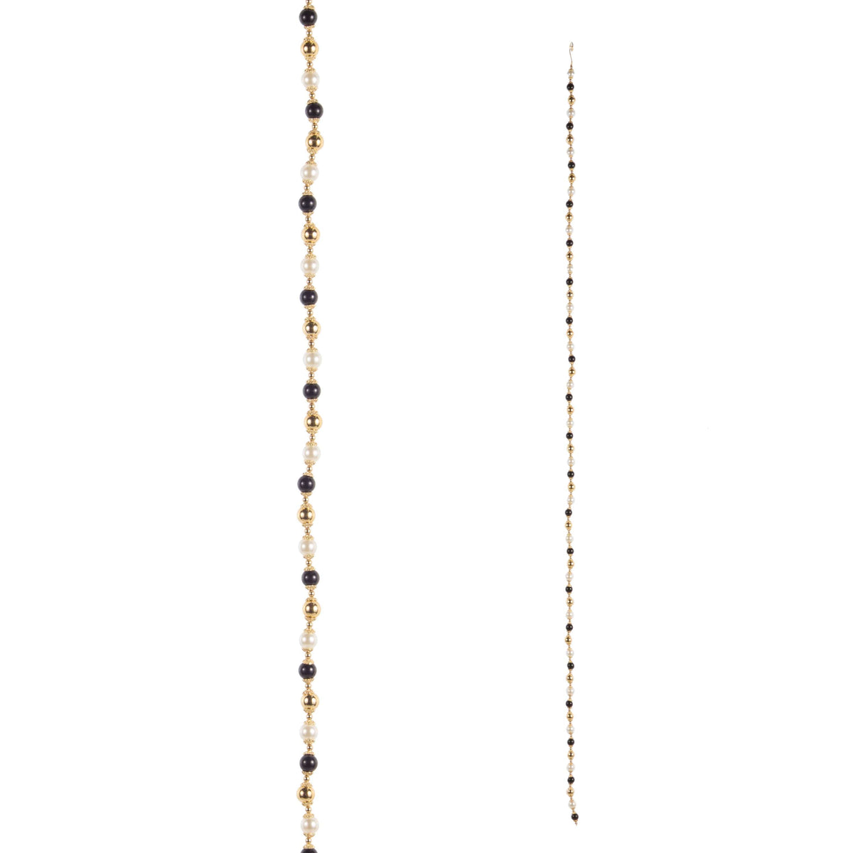 Long beaded garland with alternating black, pearl white, and gold beads, shown full length