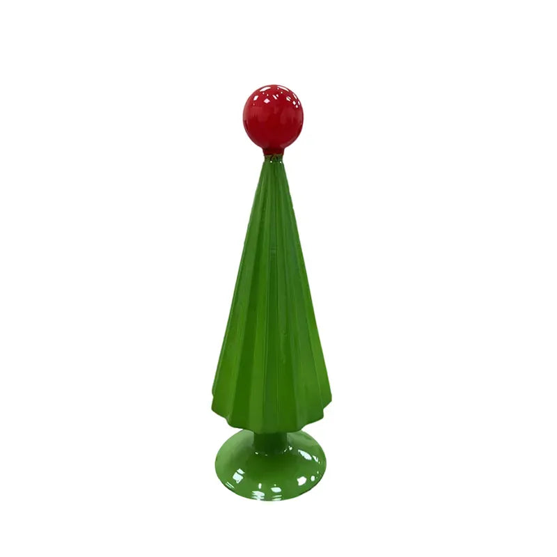 Green glass Christmas tree figurine with red ball topper on round base, 13 inches tall