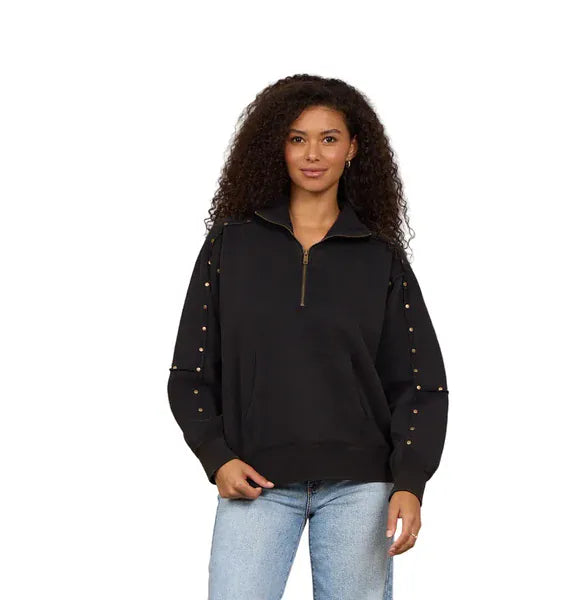 Black studded quarter-zip sweatshirt with gold stud embellishments on sleeves and kangaroo pocket